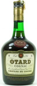 With a shoulder blob that says XXX Special; the label has a green border; 70cl; 1970s