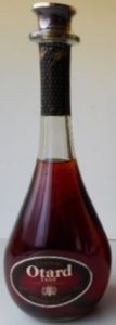 Neck capsule is straight; 70cl stated with Asian text on a red-orange label; on the back-side also Asian text