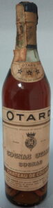 With a castle on the neck label and 'Chateau de Cognac' stated below the three stars; with a paper duty seal (est. 1950s)