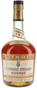 Special XXX on neck label; a sticker: not less than 24 FL.OZS; an emblem on the capsule; 70°Proof (1960s)