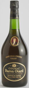 Different emblem on main label; 'fine champagne vieillie par Otard' and 'fine champagne aged by Cognac Otard'; 750ml stated on the right side; clear glass