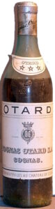 Green coloured glass; 'Mise en bouteille au chateau de cognac' is printed in stead of 'Chateau de Cognac'; no castle on the neck label; 1930s