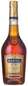 Fine cognac is breaking through the outines of the label; the neck emblem is now again three mallets (in stead of the swallow); 70cl; several symbols on the back (2010s)