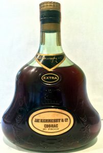 Extra on a black background; with 80 proof stated