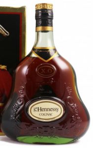 Cognac printed below Hennessy; XO different (on a lighter background); no alcohol percentage or content stated; 'Hennessy cognac France' in the outer circle all in capitals (1970s); 68cl