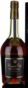 Dark blue label; also with content and percentage stated; '70cl e' stated a bit higher in the left corner below; bottom line: "Produced and bottled in Cognac France"