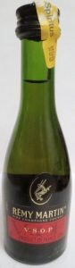with a white number on top left of label; with a paper seal; underneath it says: aoc fine champagne controlée