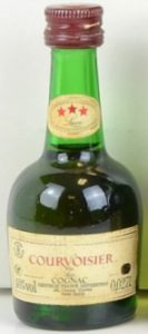 0.027L; Luxe on neck label in different letter style and with stars in red; line left and right of cognac, dividing the label