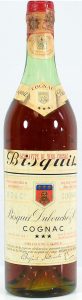 73cl stated; text in black and red (1950s); Wax and Vitale is in smaller letters, starts under the 'C' of cognac