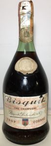 The emblem in the blob is bigger; 73cl Italian import by Wax and Vitale; with a paper duty seal. (1960s)