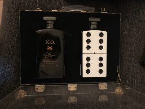 50cl XO in a case, together with a domino-bottle
