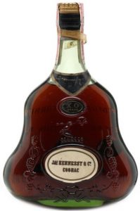 Like previous bottle with XO Brand on shoulder label; back side has one line text less and has a uk stamp, but was originally US import