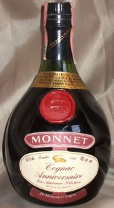 This seems to be a backside, different from the backside of the third bottle (no cotisation securité symbol); 700ml e stated; Italian import 