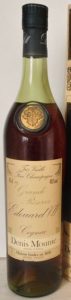 With a golden grape-leaf, label is brownish; 70cl stated in upper left corner; and with a cotisation symbol