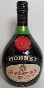 No content stated, an additional label beneath with Fine Champagne; cognac in red print; Französisches Erzeugnis, German import, Weinbrennerei Scharlachberg, Bingen am Rhein