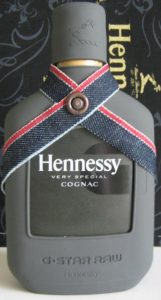 Sleeve G-Straw raw, different colours and 'Hennessy' stated beneath G-Star Raw