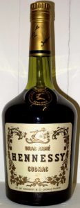 bras armé above Hennessy; 40% underneath cognac, crimped cap (said to be 1960s, but probably ca. 1973)