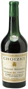 1914 grande reserve vintage cognac, tapered bottle; with 70° Proof and 'not less than 24 FL.OZ' stated (est. 1950s)
