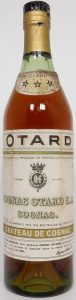With a castle on the neck label (vaguely) and 'Chateau de Cognac' stated below the three stars (est. 1950s)
