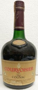 With a brown label in the shoulder blob, label itself is also brown and no bees on it; cl 70e stated; Italian import (Spirit, Genova)