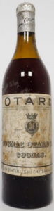 Brown coloured glass; shoulder label has fallen off; 'Mise en bouteille au chateau de cognac' is printed in stead of 'Chateau de Cognac'; no castle on the neck label; 1930s