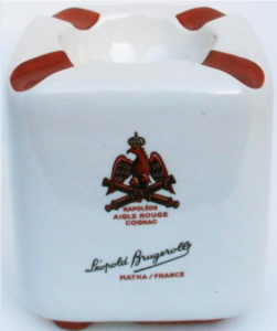 Aigle Rouge stated below the emblem, bottom has also some red paint.