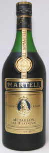 700ml, with Japanese text below; also Japanese text on the back; cork; cap has gold coloured top