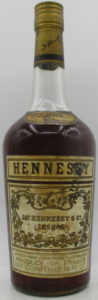 Shoulder label: Cognac - bras arme; 26 FL.OZ.; punctured label (est. early 1970s, barcode is put on later); probably Australian import
