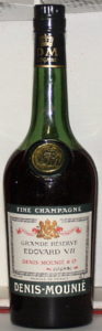 Capsule in green (no crown above DM), DM on shoulder blob in green; Fine Champagne on top of the main label on a separate band (est. late 1960s-1970s).