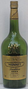 Four stars Tradition (1L), stars are black and the oval with Monnet in it is the same colour as the rest of the label.