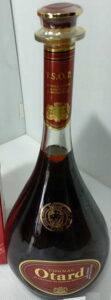 3L magnum, content on the back; cognac is stated above Otard and the emblem below