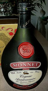 This seems to be a backside, different from the backside of the third bottle (no cotisation securité symbol); 700ml e stated