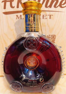 70cle, with text: 'Louis XIII de Rémy Martin'. With a pregnancy warning and a green point symbol. 