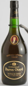 Different emblem on main label; 'fine champagne vieillie par Otard' and 'fine champagne aged by Cognac Otard'; 700ml stated on the right side; clear glass