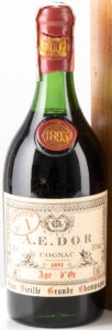 Red wax top with AEDOR on it; 1893 on the label; content and ABV in grey colour; text 'product of france' between the year and the word cognac; 1893 written in the blob; with a paper duty seal.
