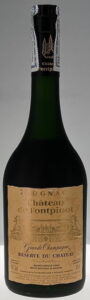 Different emblem on the capsule; import information: Spanish, Comercial Rovirosa SA, Barcelona; this bottle has 'produce of France' and 'appellation controlée' stated above the content and ABV; with a paper duty seal
