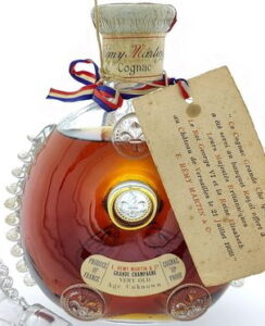'Very Old, Age unknown', 70 proof; 10 fins on both sides; Royal Banquet card from 1938. Baccarat logo underneath. 1951-1957, bottle no. 987; English market.