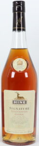 70cle petite champagne; slender bottle shape, text in English