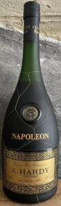 It says: Grande Fine Champagne; 0,70L and 40%vol are in italics (estim. 1980s)