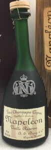 Same label as previous bottle but with an elaborate 'N' on the shoulder