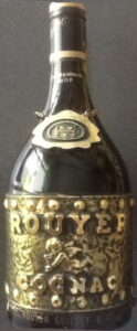 Below: Rouyer Guillet; damoisel; fine champagne vsop in small letters on the neck