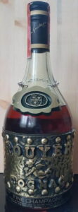 Below: Fine Champagne, with Italian importer info, damoisel; paper duty seal; 1968
