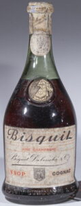 Old bottle; Fine champagne in red letters