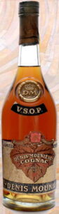 This looks like a falsificatiom; to me this is a gold leaf bottle and somebody stuck a VSOP label on it
