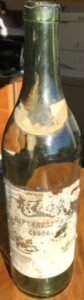 Old bottle, probably 3 stars, sadly the text next to 'bottled' is not legible, maybe the Royal Warrant?; below it possibly: Hudson Bay; estim 1920s or before