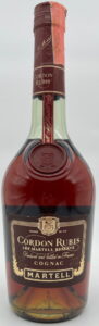 Left of cognac is written 70cl e; right of cognac it says: gradi 40%vol (click to see details); with a paper seal on top (1980s)