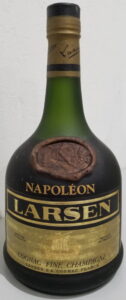 capsule in reversed colours, with a back label