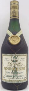 Capsule with emblem, Napoléon depicted; 700ml; text is in a different font; no 'mise en bouteille en Cognac' underneath and a different back side