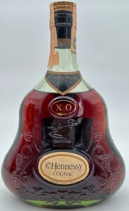 With a paper seal on top (70cl); Italian import, Claretta; different back-side.