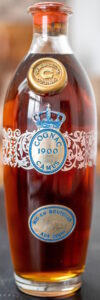 Distilled in 1900, bottled in 2000; sterling silver labels.